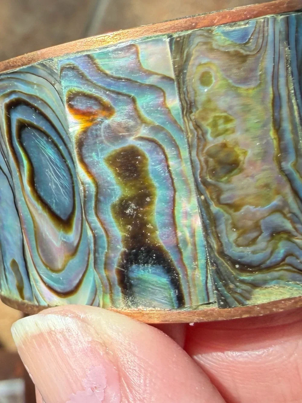 Copper and abalone shell napkin rings